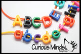 Lacing Alphabet Beads Busy Bag - Fine motor and early reading learning activity. Sort by shape and color. Travel activity