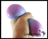 Nee-Doh Color Changing Soft Doh Filled Stretch Ball - Ultra Squishy and Moldable Relaxing Sensory Fidget Stress Toy