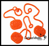 Sticky Pumpkin Jack-O-Lantern on a String - Halloween Party Favor Set - Small Novelty Toy Prize Assortment Gifts (6 Dozen)