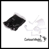 Melting Skeleton Putty Slime - Black Slime with Skeleton Bone Body Parts - Halloween Party Favor Spooky