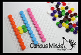 Snap Button Peg Board Toy