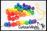 Lacing Beads Busy Bag - Perfect fine motor learning activity for toddlers and preschoolers.  Sort by shape and color.  Travel activity