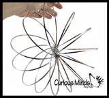 Magic Kinetic Infinity Ring Toy - Flowing Flower Spring Spinning Moving Metal Ring - Fidget Toy That Moves From Arm to Arm Trick