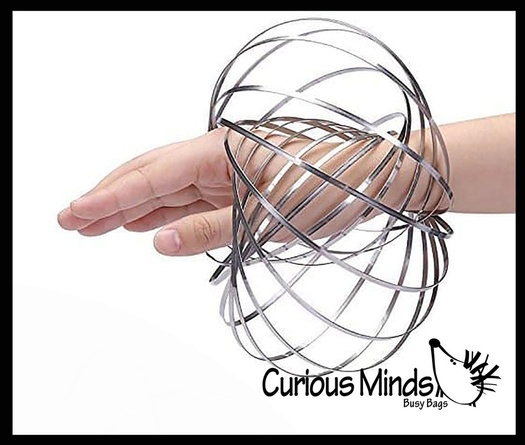 Magic Kinetic Infinity Ring Toy - Flowing Flower Spring Spinning Moving Metal Ring - Fidget Toy That Moves From Arm to Arm Trick