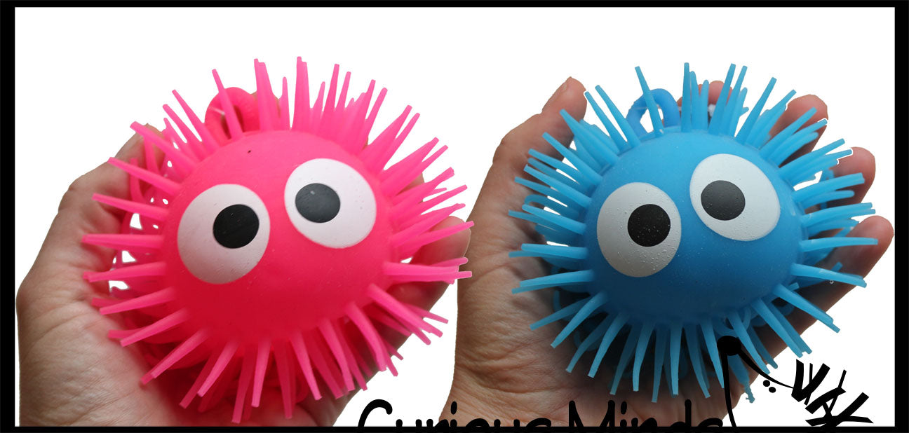 Puffer balls with best sale eyes