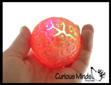 Nee-Doh Magma Volcano - Soft Gel Filled Stress Ball with Mesh Web That Lights Up - Ultra Squishy Light Up Relaxing Sensory Fidget Stress Toy Needoh