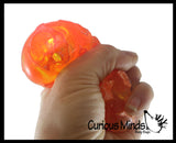 Nee-Doh Magma Volcano - Soft Gel Filled Stress Ball with Mesh Web That Lights Up - Ultra Squishy Light Up Relaxing Sensory Fidget Stress Toy Needoh