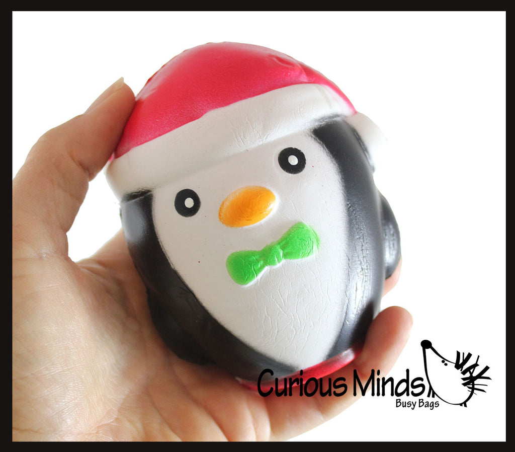 Large Penguin with Santa hat Slow Rise Squishy Toy - Memory Foam Squish Stress Ball - Winter Christmas