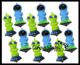 LAST CHANCE - LIMITED STOCK - Wind Up Alien and Astronaut Launcher Spinning Top Toy